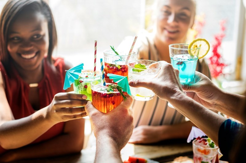 A group of girlfriends gets together for drinks after work to complain about their bosses away from the office. 