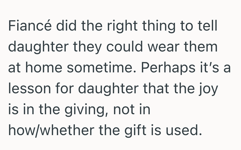 Fiancé did the right thing to tell daughter they could wear them at home sometime. Perhaps it's a lesson for daughter that the joy is in the giving, not in how/whether the gift is used.