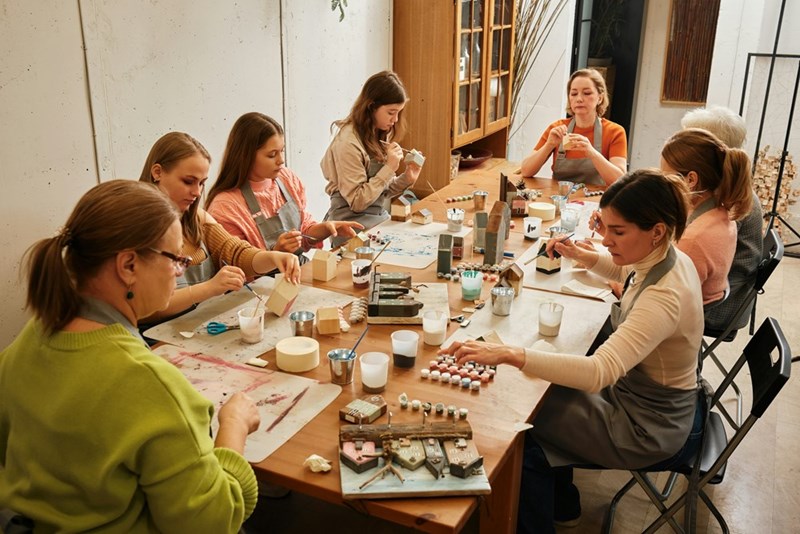 Women doing crafts at a crafting studio 