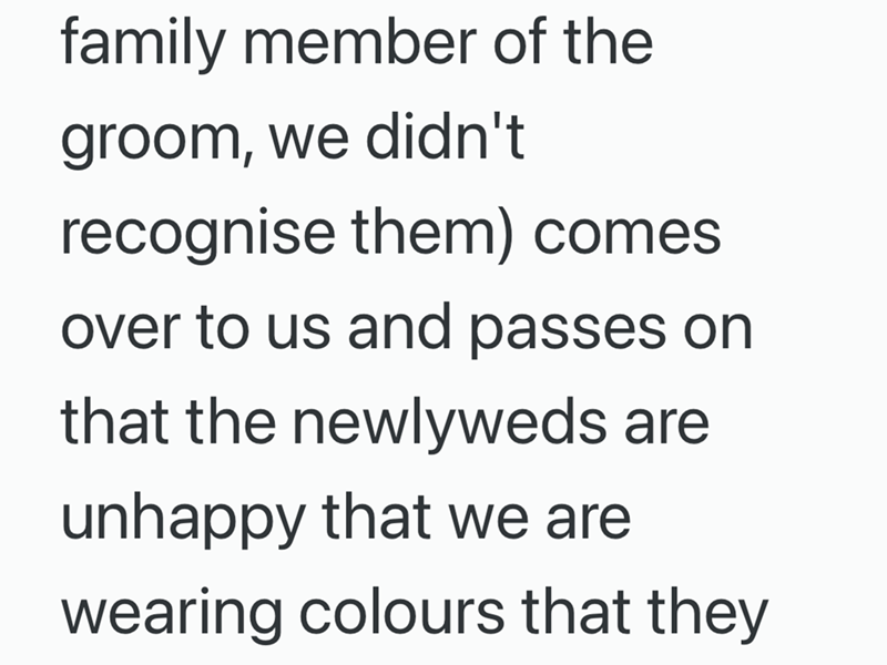 family member of the groom, we didn't recognise them) comes over to us and passes on that the newlyweds are unhappy that we are wearing colours that they