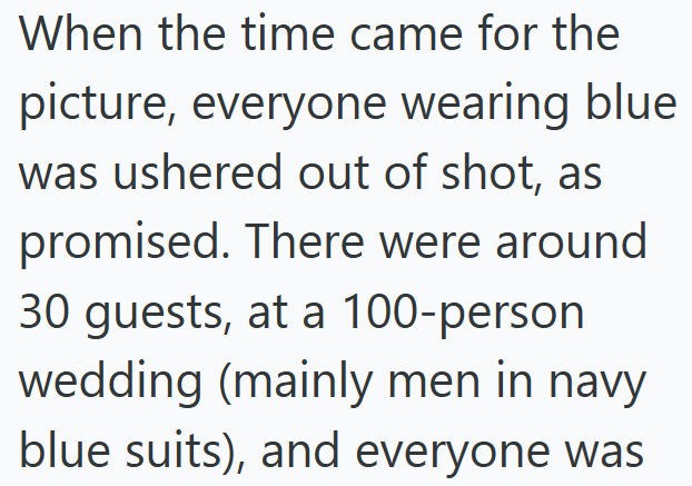 When the time came for the picture, everyone wearing blue was ushered out of shot, as promised. There were around 30 guests, at a 100-person wedding (mainly men in navy blue suits), and everyone was
