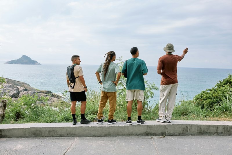 A tour guide explaining the view to a group of people.