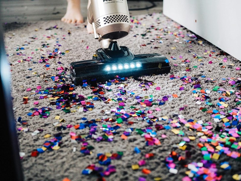 The woman uses a vacuum cleaner to make cleaning easier for herself, which, for some reason, drives her husband wild. 