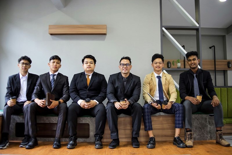 group of men in suits