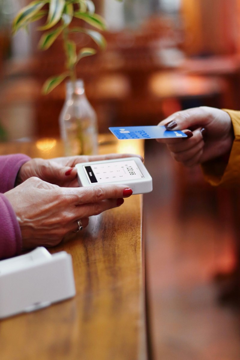 a woman using her credit card