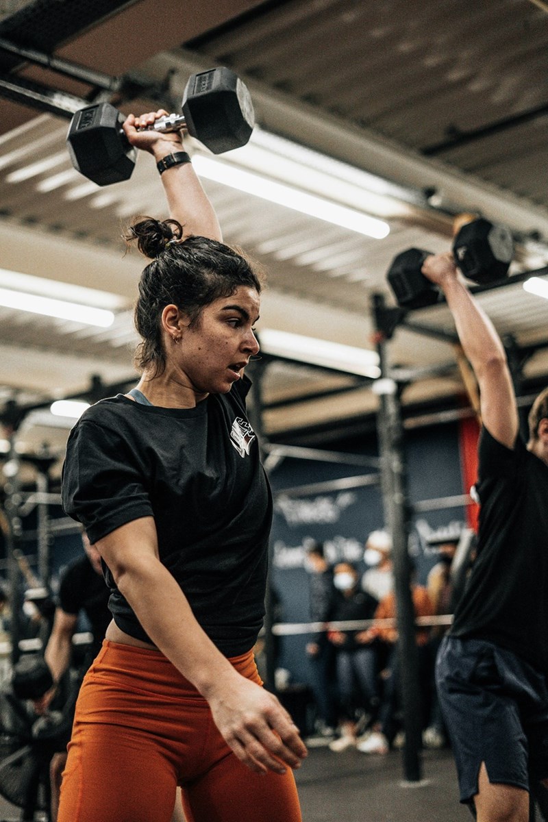 a woman lifting weights
