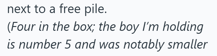 next to a free pile. (Four in the box; the boy I'm holding is number 5 and was notably smaller