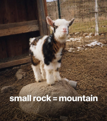 small rock = mountain