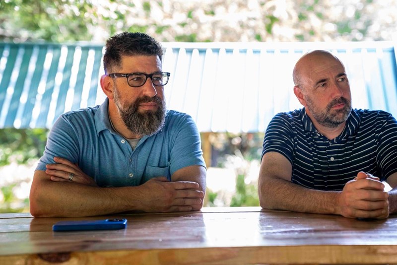 Neighbors sit down for a tense discussion about a shared fence, property responsibilities, and ongoing homeowner disagreements.