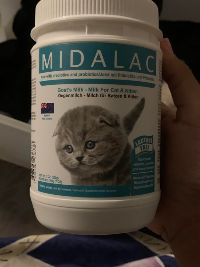 142 MIDALAC Now with prebiotics and probiotics/Jetzt mit Präbiotika und Probi Goat's Milk - Milk For Cat & Kitten Ziegenmilch - Milch für Katzen & Kitten SUZ New Zagland NET WT 7 02 (200g) PODS NET: 200g (7 OZ) Sold by weight, not by volume/ Verkauft Gewichts nicht Volumen LACTOSE FREE Natural with vitamins, mi and trace t Natur mit Via Mineralstollen Spuren MAUK MARK BEER