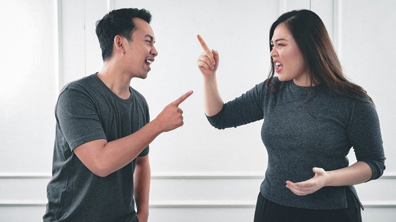 man discussing with woman
