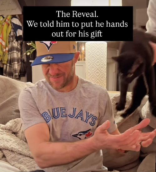 The Reveal. We told him to put he hands out for his gift BUE JAYS