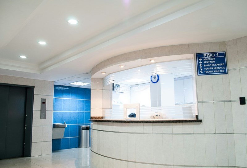 Hospital reception area representing the workplace where the employee reported for duty.