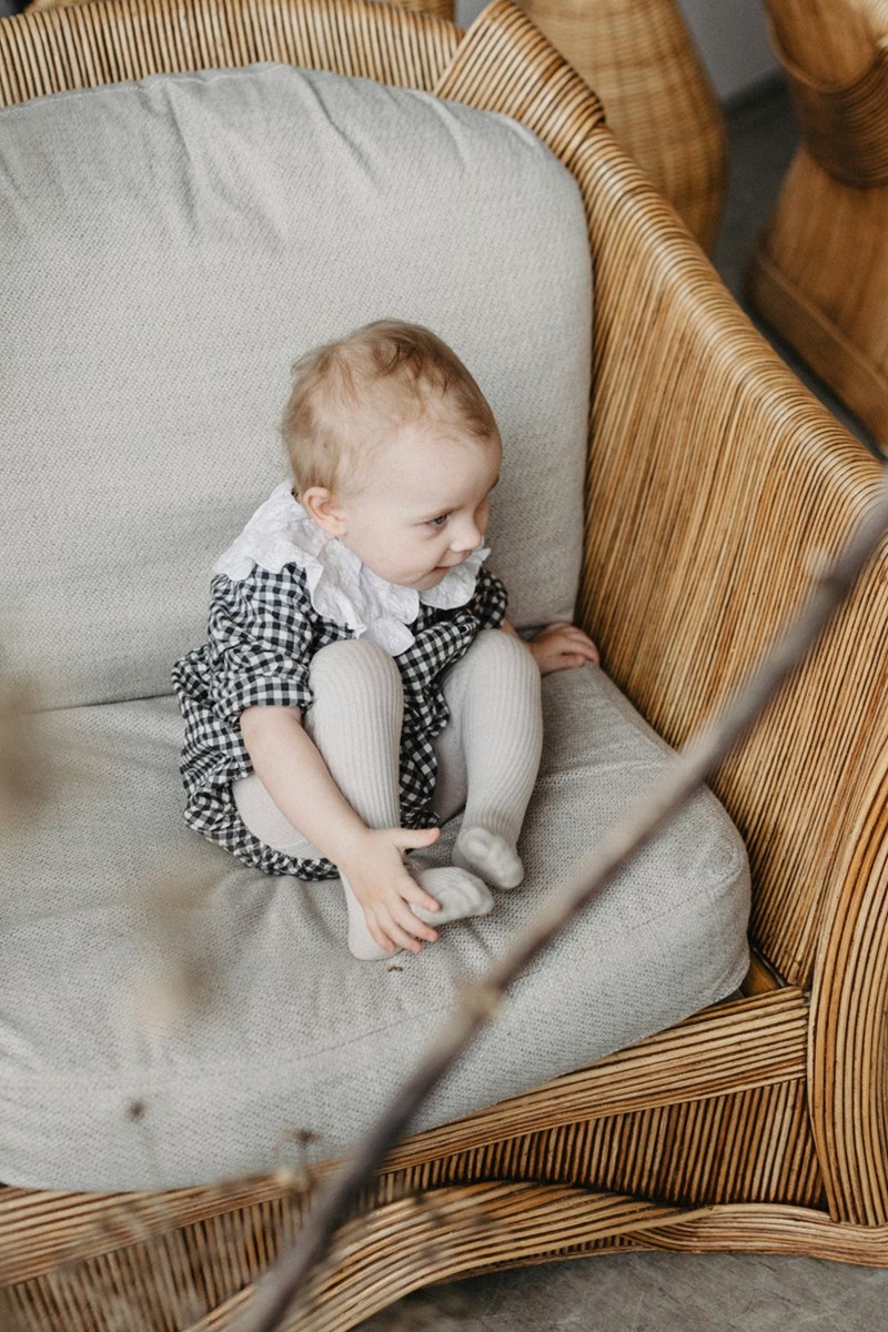 A baby who needs a responsible person to watch her at all times in order for her to stay safe. 