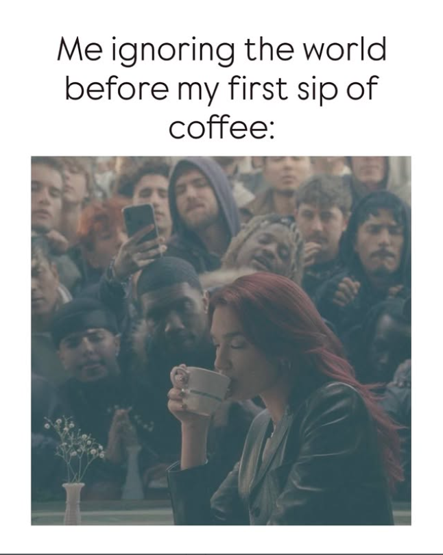Me ignoring the world. before my first sip of coffee: