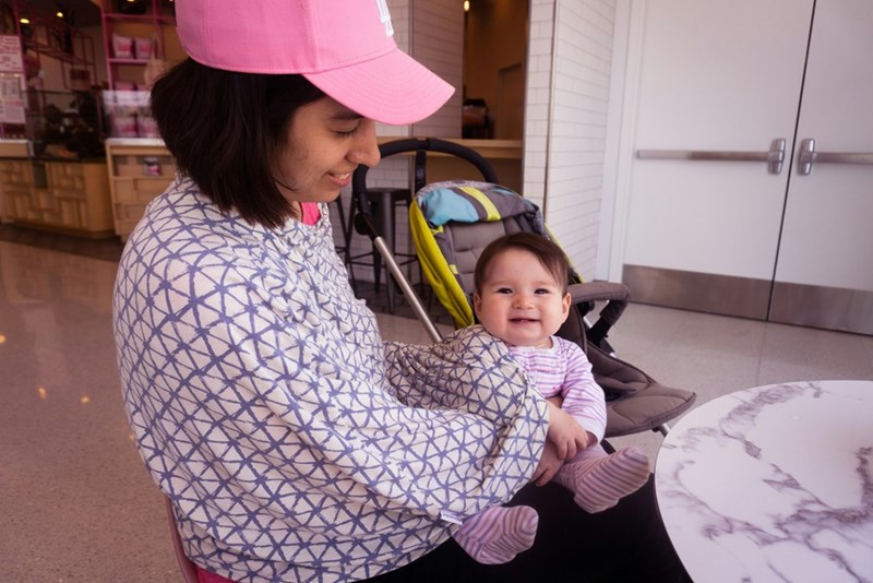 A girl babysitting a baby. Representation.