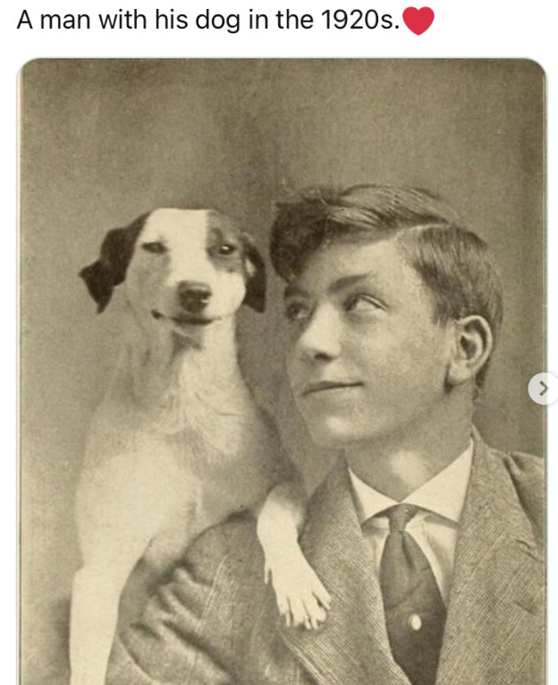 A man with his dog in the 1920s. >
