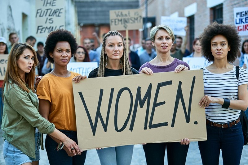 The daughter is standing up for women as an adult.