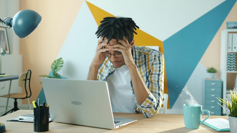 After another frustrating day battling slow systems and outdated equipment, the employee wonders why returning to the office was considered an upgrade.