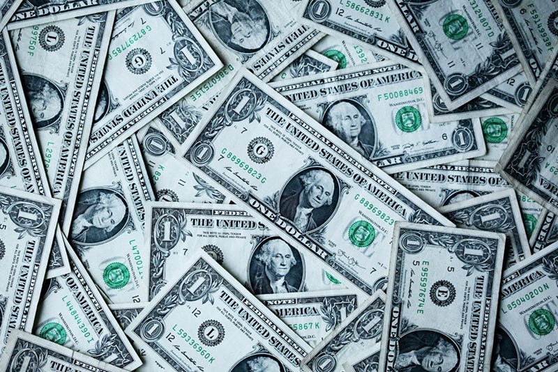Money spread on a table.