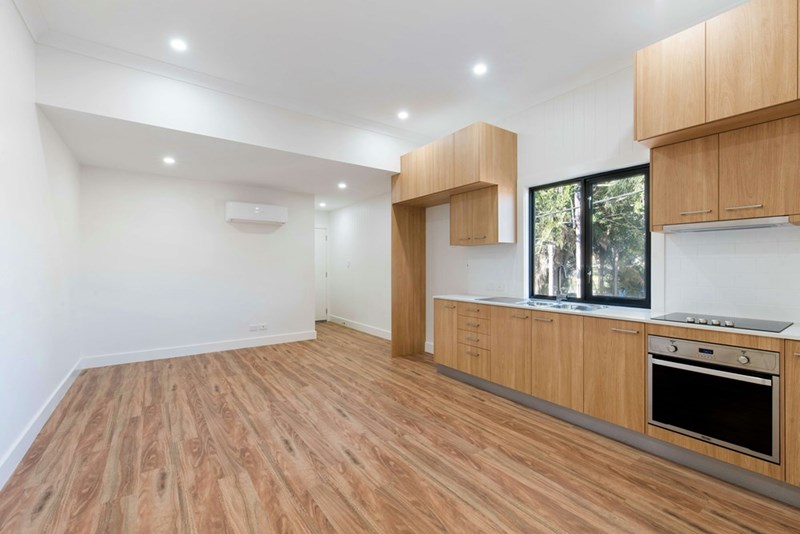 A wood-style new apartment without furniture.