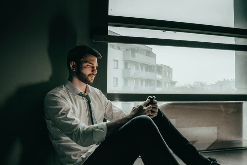 man using smartphone