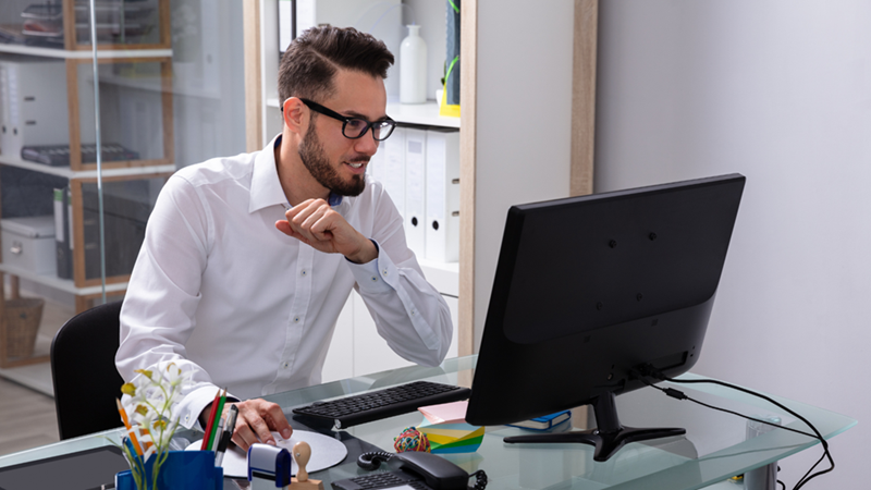 Man Working on Office Computer