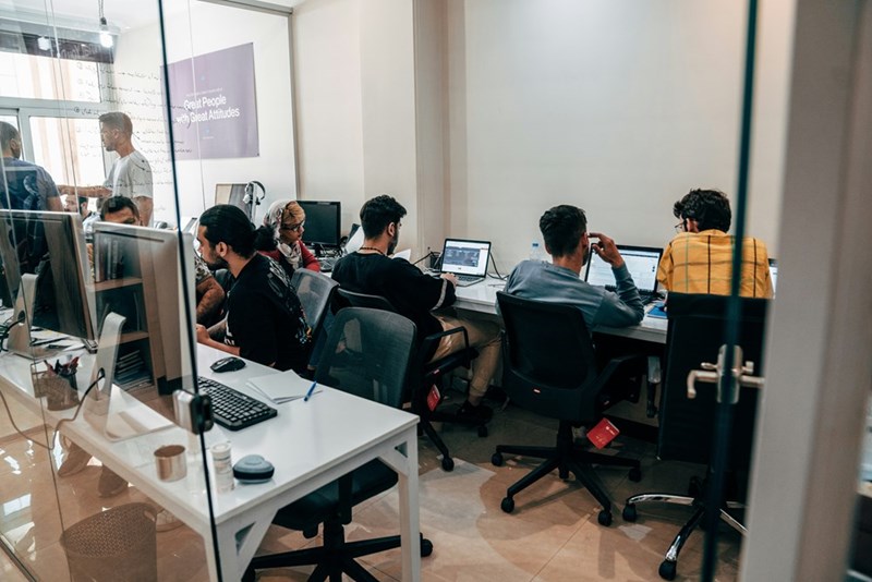 Working in a full office.
