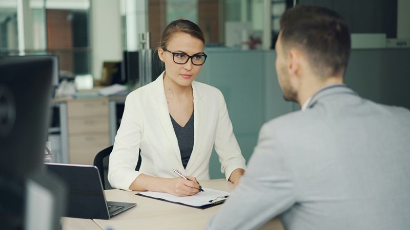 HR manager interviewing job candidate.