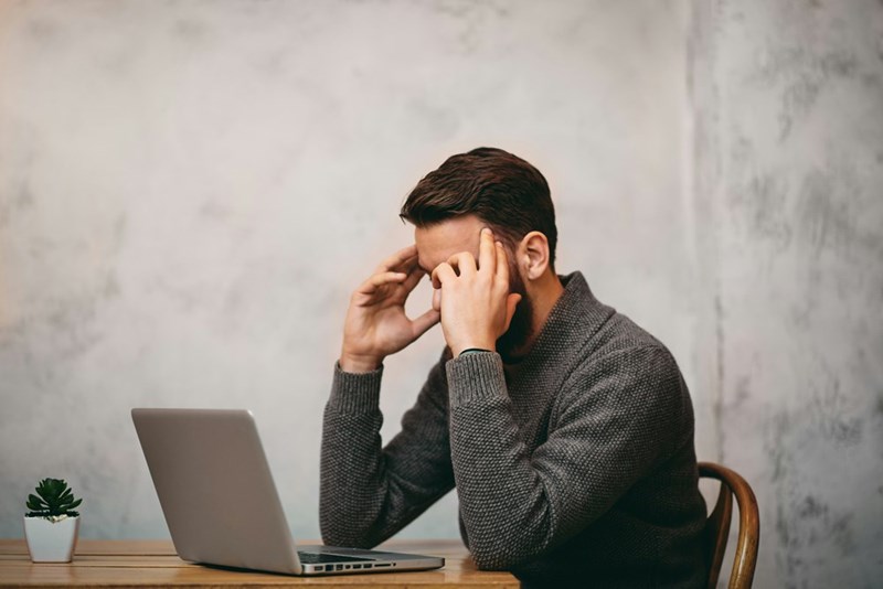 Job candidate feeling frustrated after spending weeks navigating an exhausting nine-step interview process.