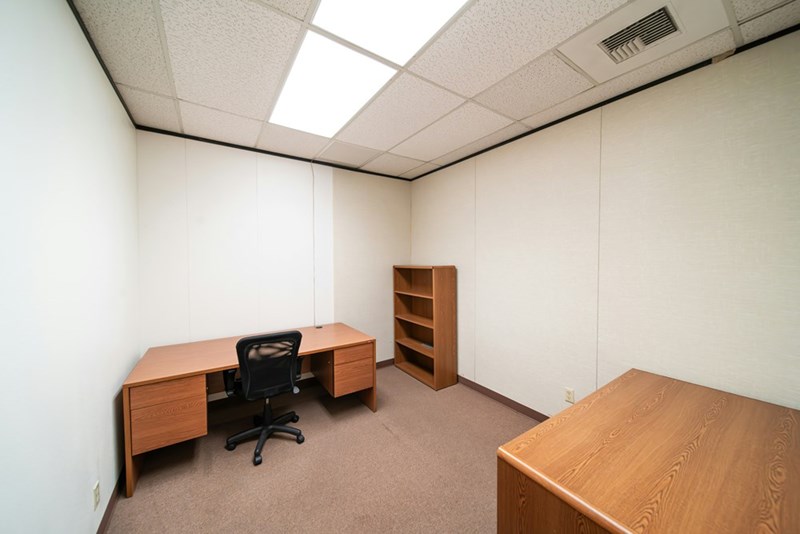 empty room with a desk
