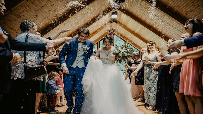 A bride and a groom at their wedding after getting married. Representation.