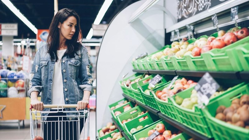 A woman doing grocery shopping. Image for illustrative purposes.