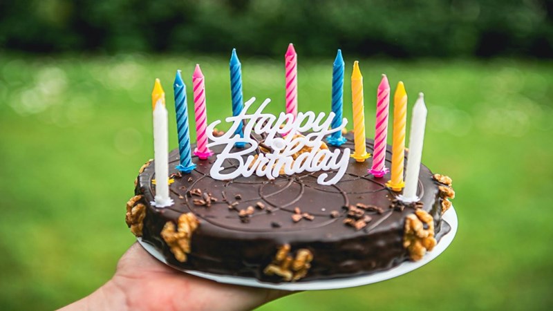 A birthday cake with candles.