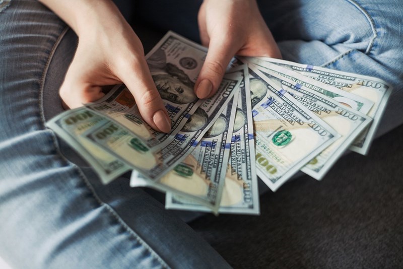 A stack of cash changes hands after a boyfriend says he has already given his girlfriend thousands while trying to save for his own future.