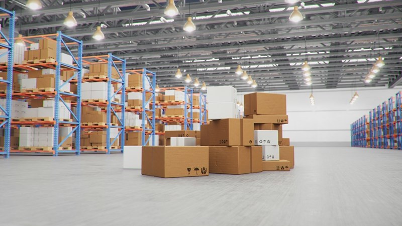 Boxes fill a warehouse floor similar to the workplace where a 22-year-old employee was blamed for missing company equipment.