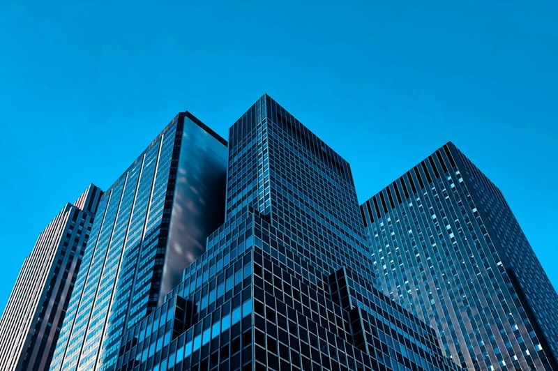 Different office buildings seen from the outside.