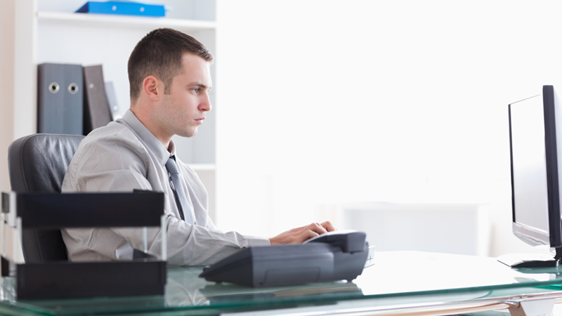 Employee writing an email.