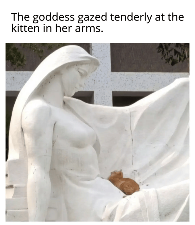 The goddess gazed tenderly at the kitten in her arms.