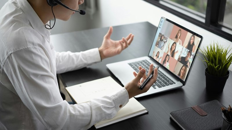 Workers on a Zoom call.