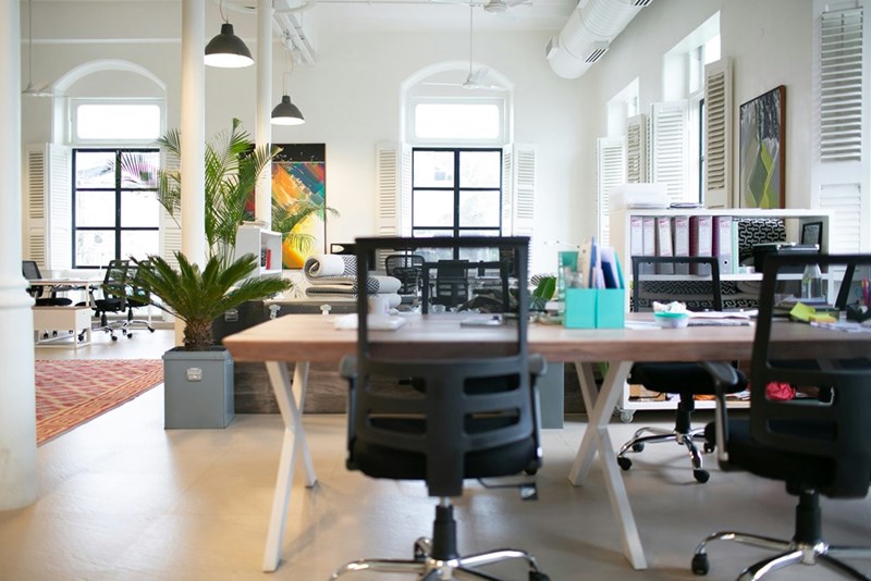 An office with office chairs and desks.