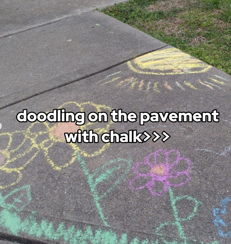 doodling on the pavement with chalk>>>