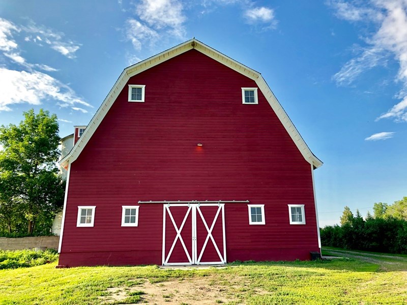 The barn where the teenagers work out using the gym equipment they bought.