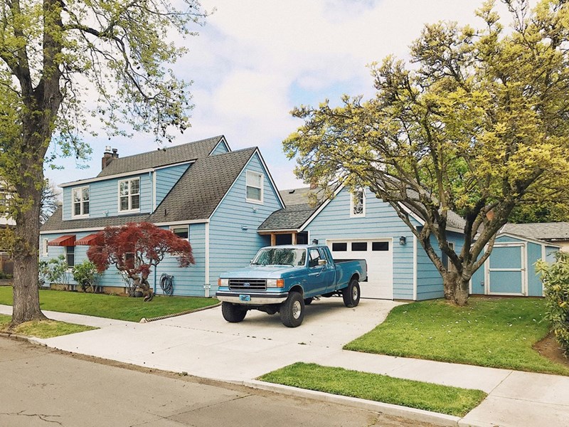 A vehicle parked in a private residential driveway.