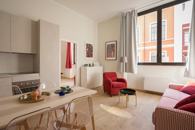 Tidy room filled with furniture