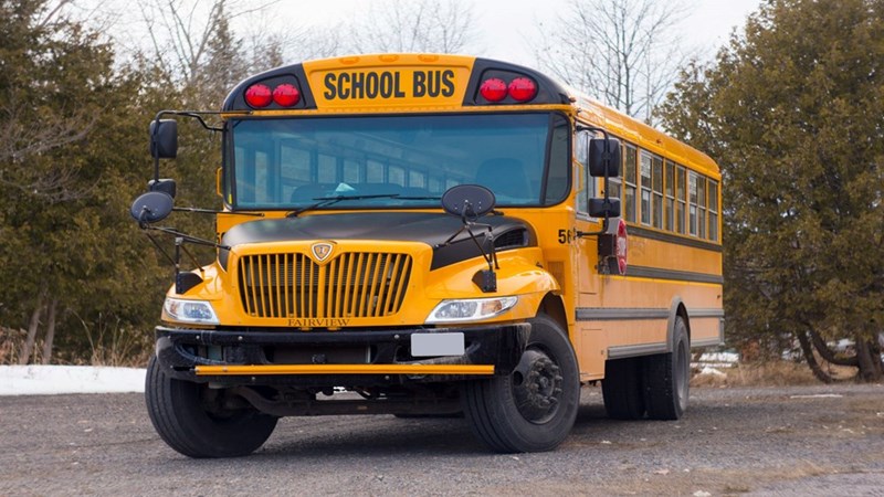 A school bus on the way to pick up the students.