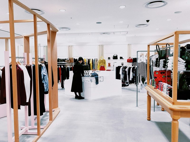 A retail store full of clothes.