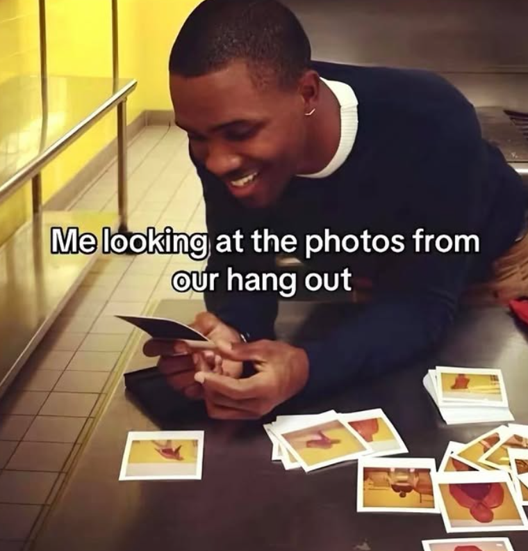 Me looking at the photos from Our hang out