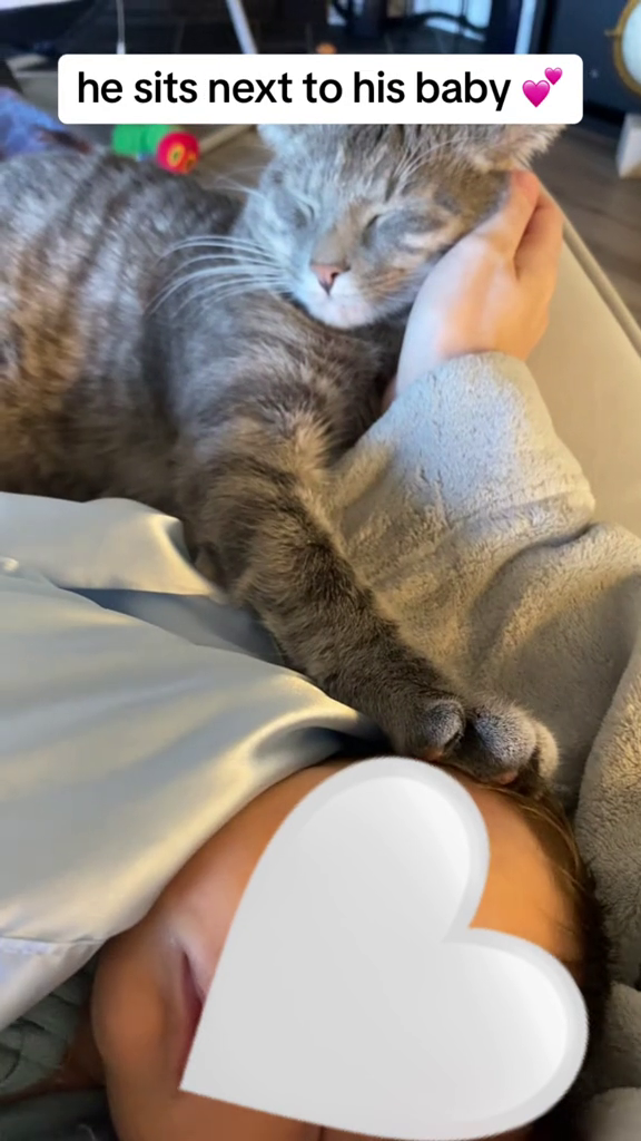 he sits next to his baby ♥