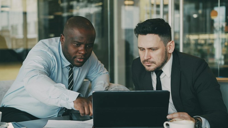 A supervisor reviews work with an employee who later asks him for a recommendation for another job.